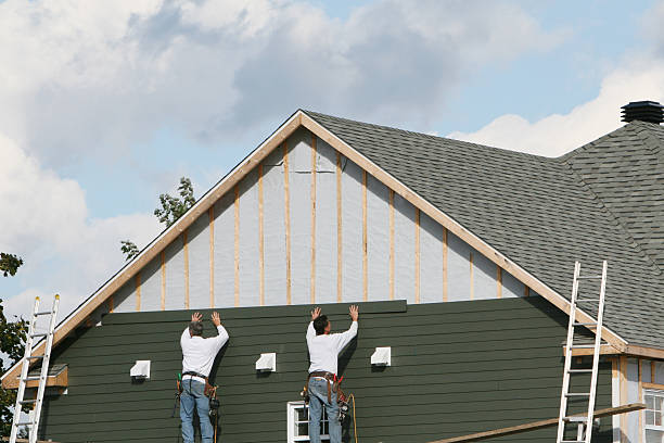 Professional Siding technician working in Woodville, VA